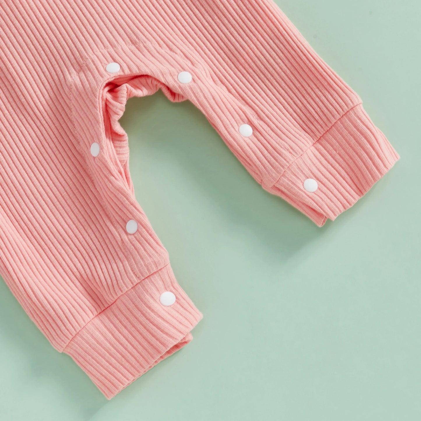 Pink ribbed overalls from New To The Crew baby newborn set -