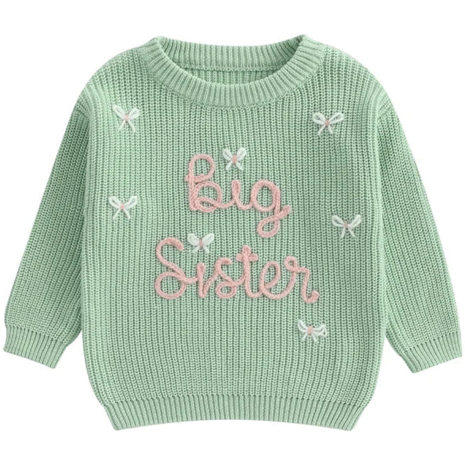 Green baby girl jumper with Big Sister text