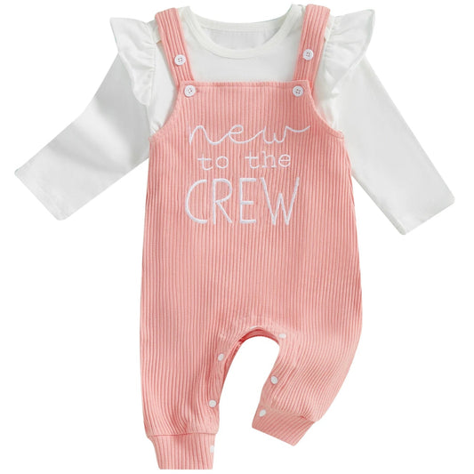 Newborn outfit from Pipp & Lola – white romper and pink embroidered overalls for baby girls
