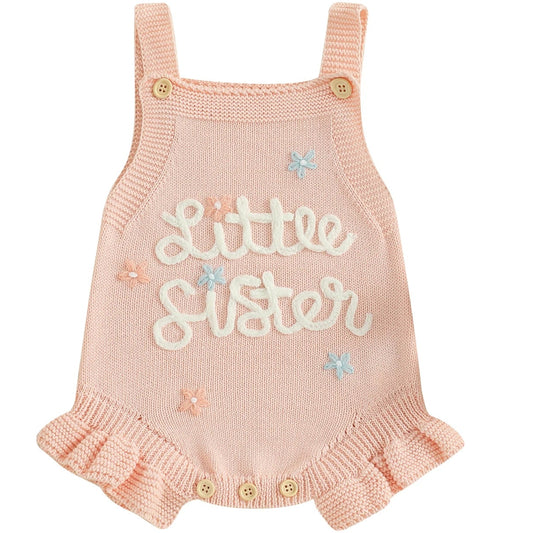 Apricot knit romper with white embroidery