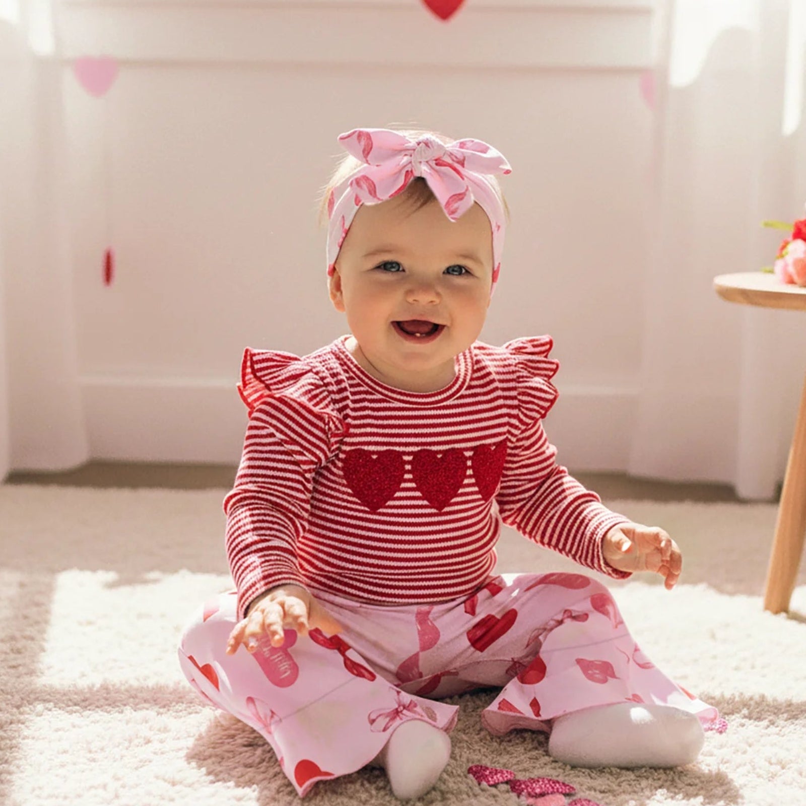Baby girl striped long sleeve top with heart detail and flare pants