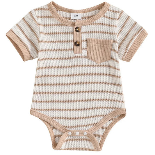 Beige baby boy romper in soft ribbed cotton – classic Henley style with wooden buttons and pocket from Pipp & Lola
