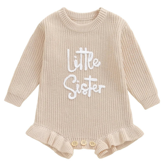 Cream knitted baby girl romper with white “Little Sister” embroidery