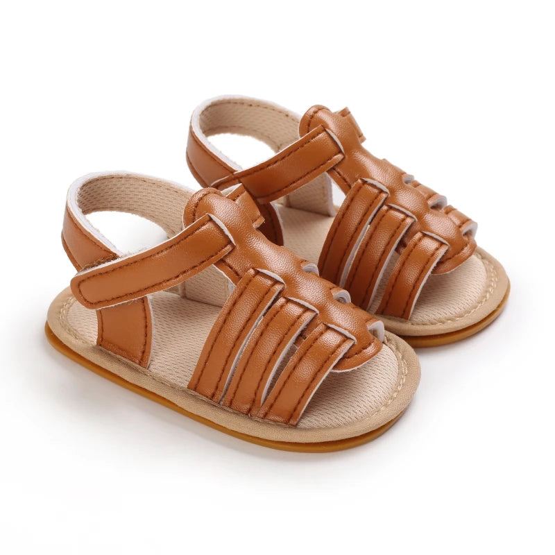 Brown Marlow baby fisherman sandals featuring woven-style straps, flexible soles and adjustable Velcro fastening | Pipp & Lola