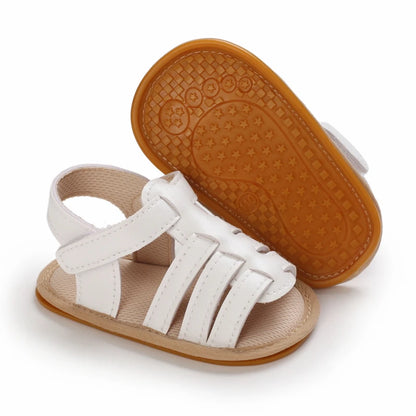White Marlow baby fisherman sandals with flexible soles, classic woven-style design and adjustable Velcro straps | Pipp & Lola