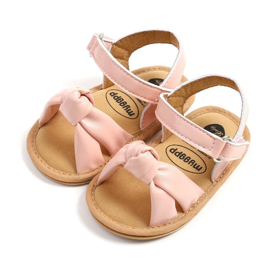 Pink baby sandals with velcro strap