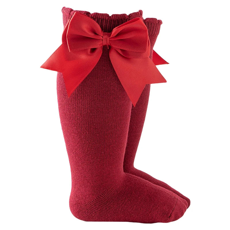 Ruby red baby girl knee-high socks with silk bows
