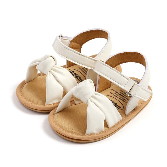 Soft sole white sandals for baby girls