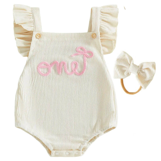 White baby girl “ONE” romper with pink embroidery